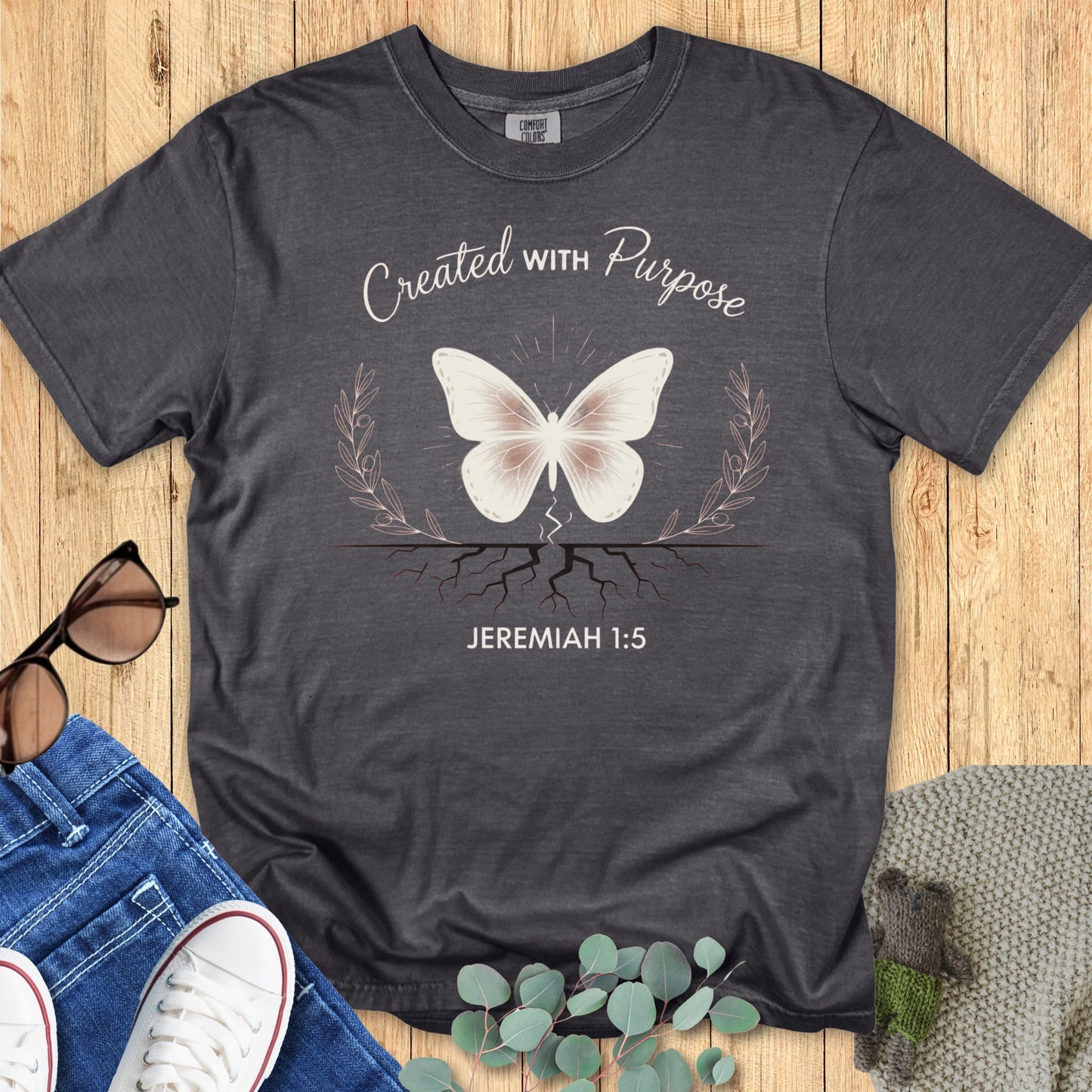 Comfort Colors 1717 pepper “Created With Purpose – Jeremiah 1:5” t-shirt with a minimalist butterfly and rooted design. A modern Christian shirt symbolizing identity and purpose — perfect women’s scripture tee and inspiring Christian mom gift idea.