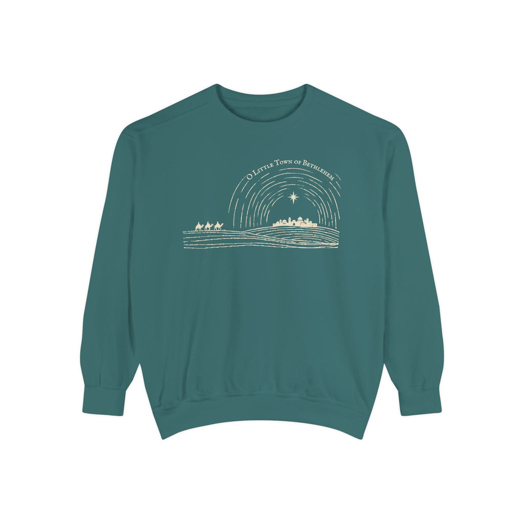 Blue Spruce Christian Christmas sweatshirt with line art of Bethlehem under a star, three travelers on camels and O Little Town of Bethlehem lettering.