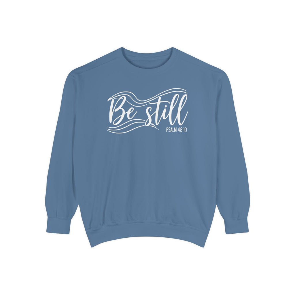 Blue Jean Christian sweatshirt reading Be still in flowing brush script with sweeping lines, Psalm 46:10