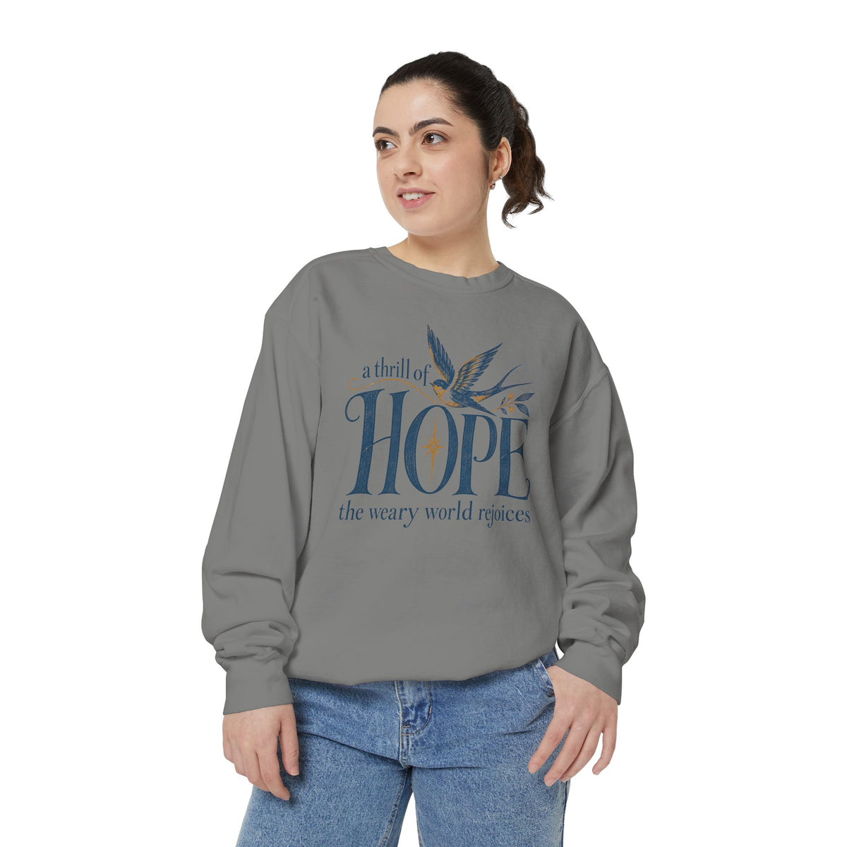 Christian Christmas sweatshirt with A Thrill of Hope, the weary world rejoices lettering, a swallow and a star.