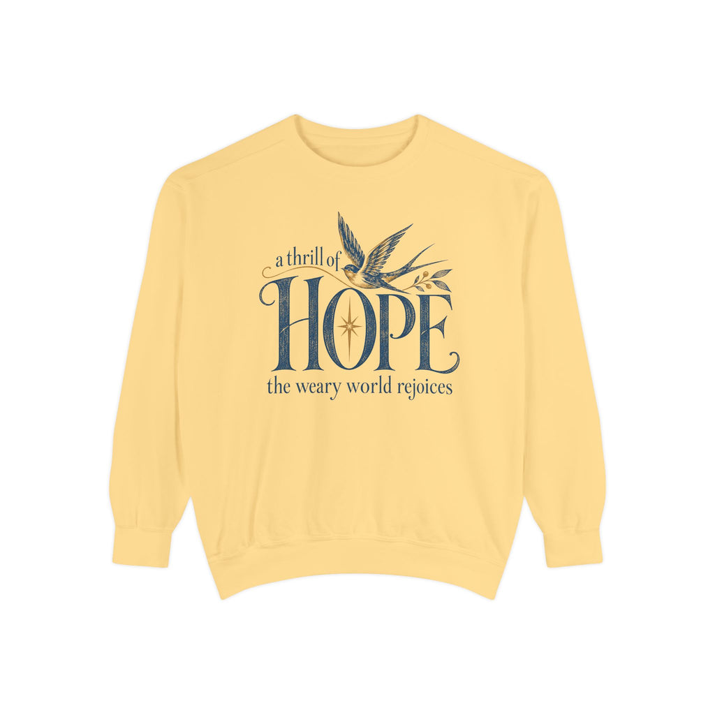 Butter Christian Christmas sweatshirt with A Thrill of Hope, the weary world rejoices lettering, a swallow and a star.
