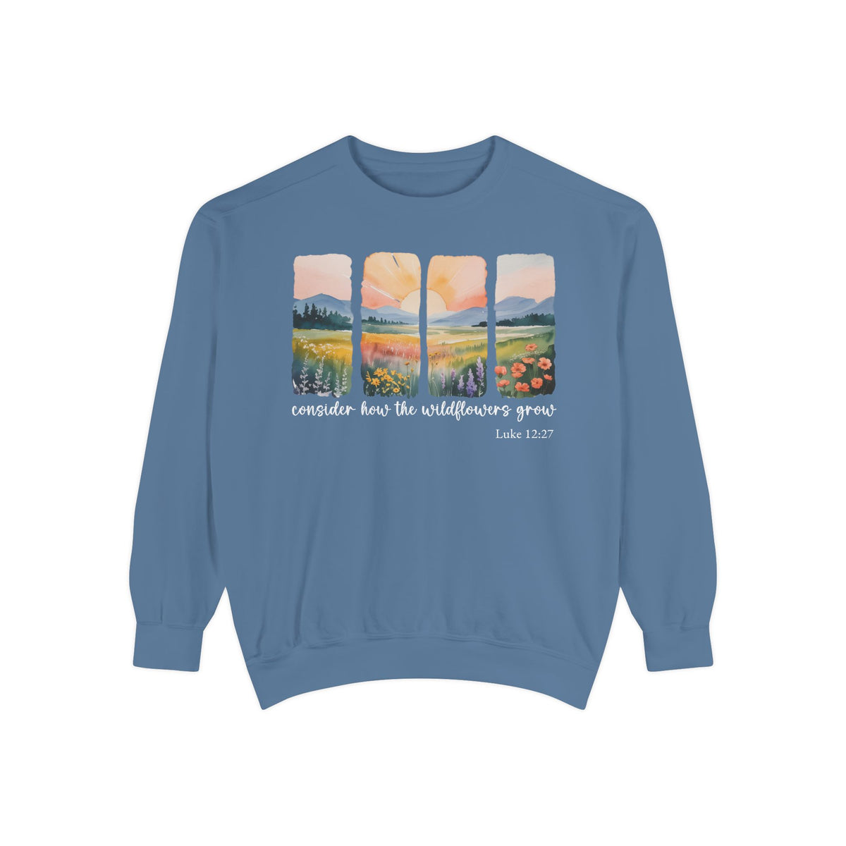 Blue Jean Christian sweatshirt with four painted panels of sunrise over hills and a wildflower meadow, reading consider how the wildflowers grow, Luke 12:27