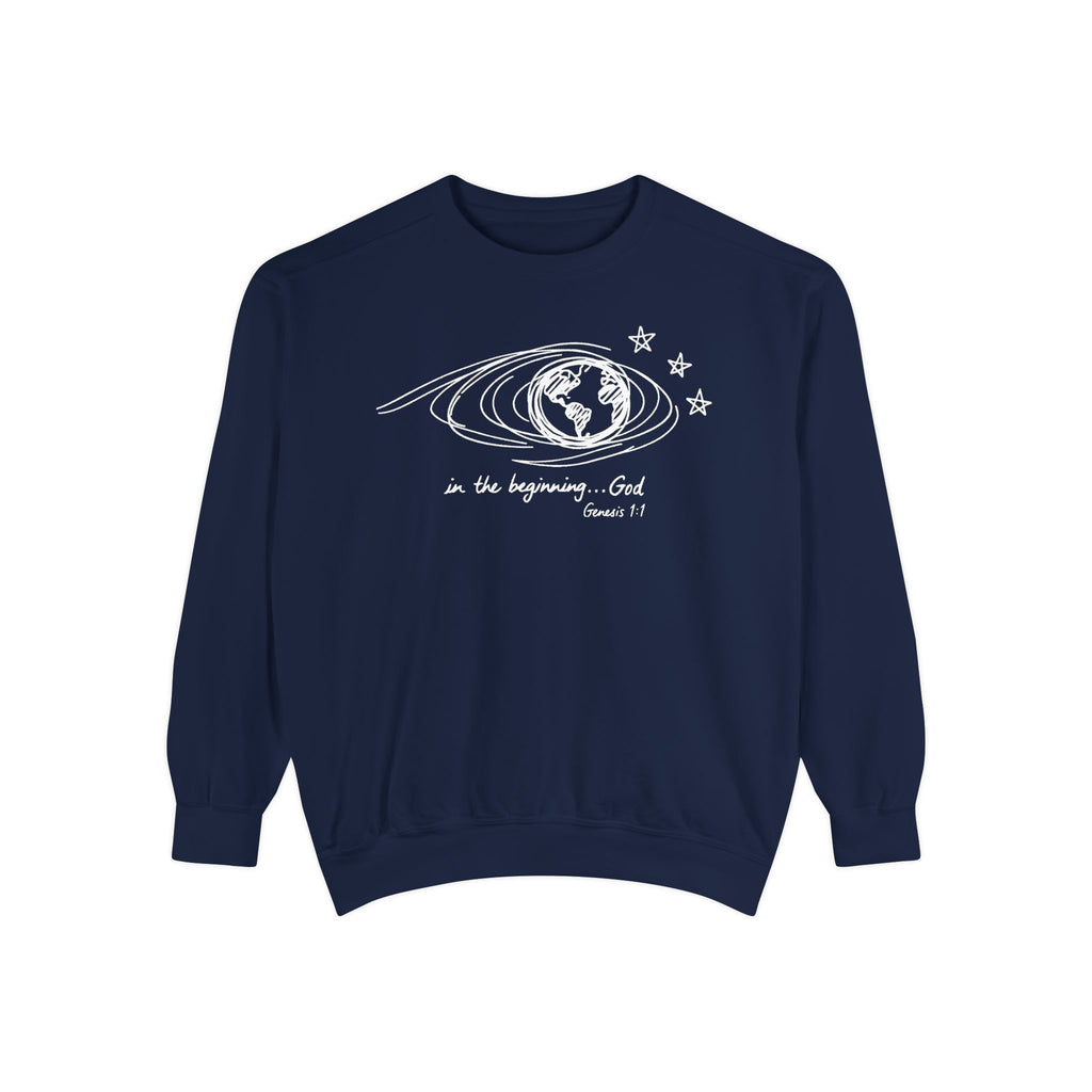 True Navy Christian sweatshirt with hand-sketched Earth, looping orbit lines and three stars, reading in the beginning God, Genesis 1:1