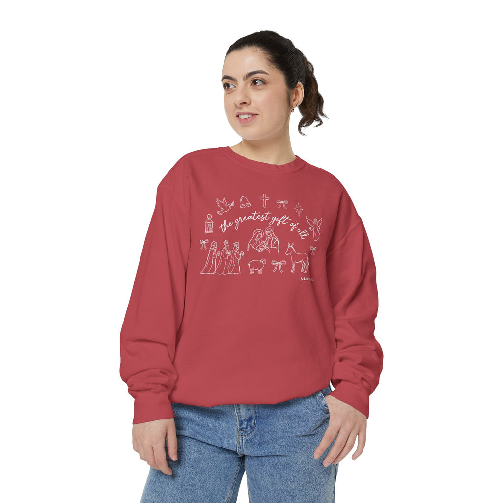 Christian Christmas sweatshirt with the greatest gift of all script and line art of the holy family, wise men, a donkey, a lamb, an angel, a dove, a cross and Matthew 1:21.