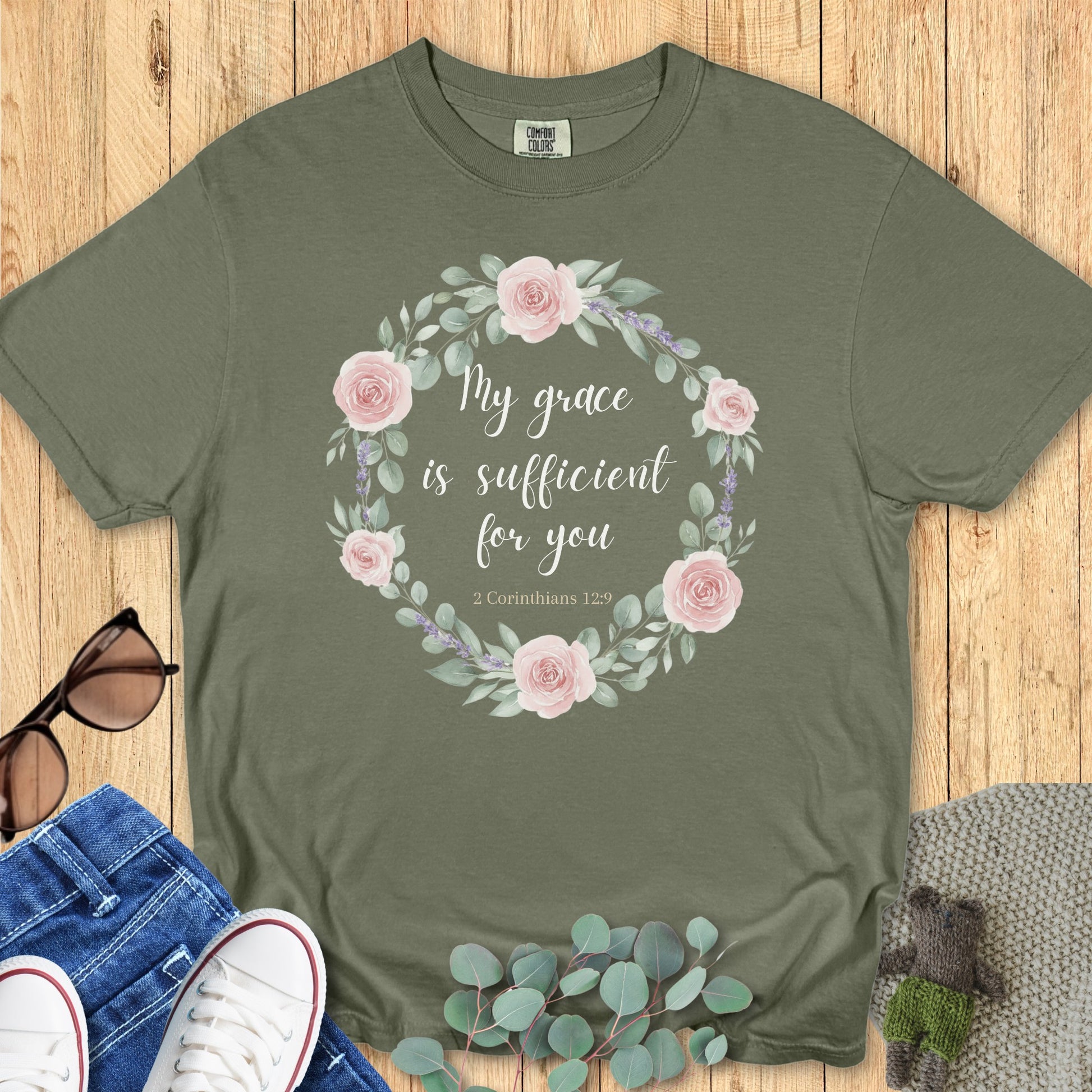 Comfort Colors 1717 sage “My Grace Is Sufficient for You – 2 Corinthians 12:9” t-shirt with blush rose floral wreath artwork. A graceful faith-based apparel for women reminding of God’s sustaining love.