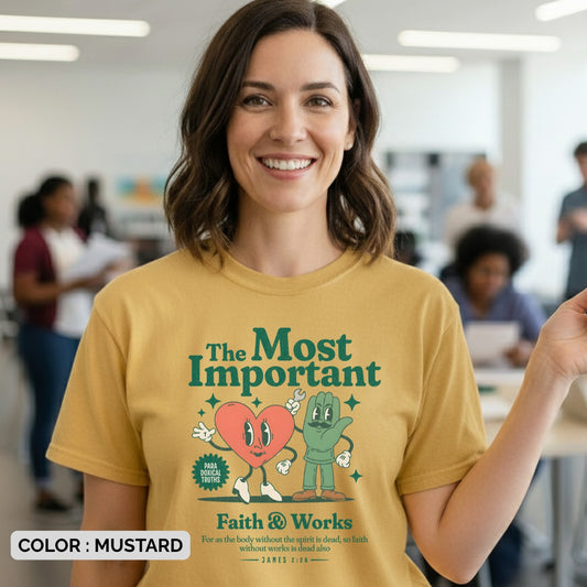 Woman wearing a Comfort Colors 1717 mustard “Faith & Works” t-shirt with heart and hand characters and James 2:26 scripture. A playful women’s scripture tee - faith-based apparel for women and modern Christian shirt, uplifting Christian mom gift idea for daily encouragement.