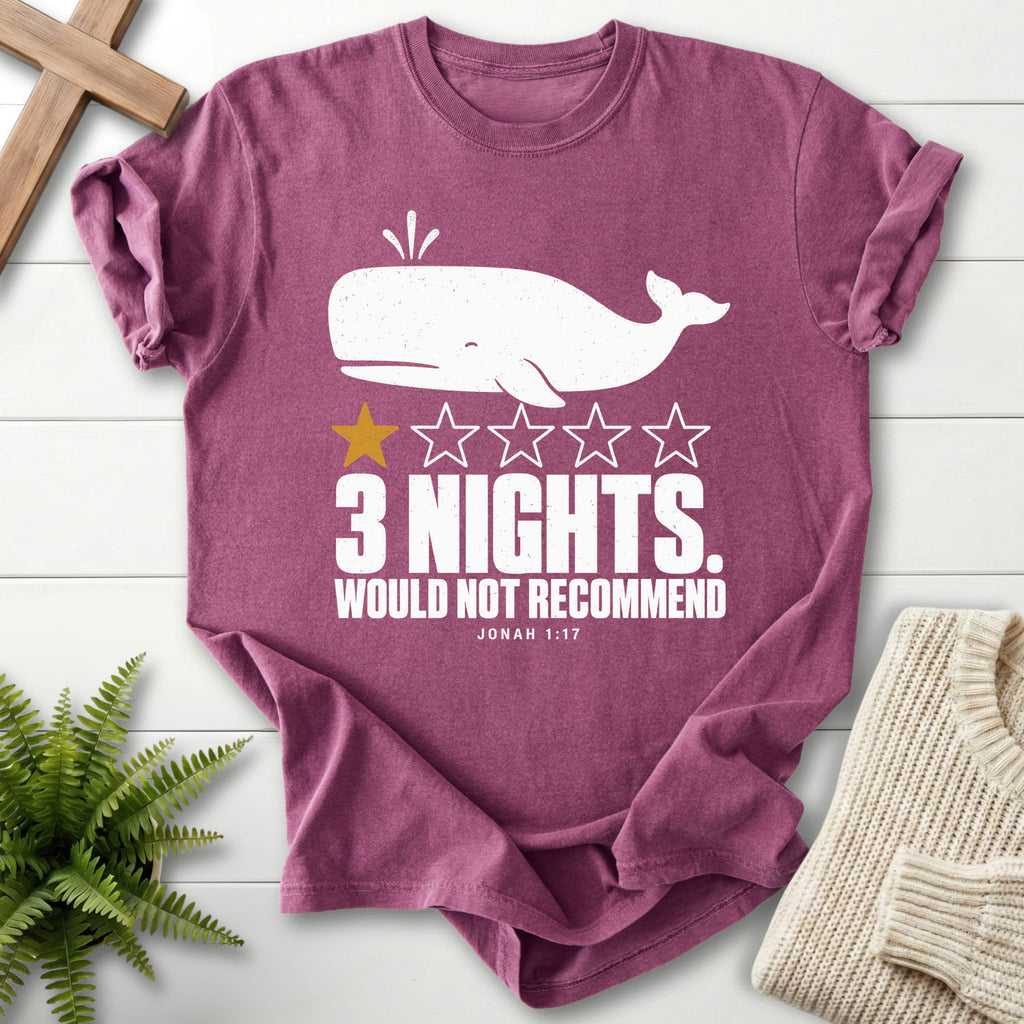 Flat lay of a Berry Christian graphic tee featuring minimal whale artwork with "3 Nights Jonah 1 17 Dark T-Shirt".