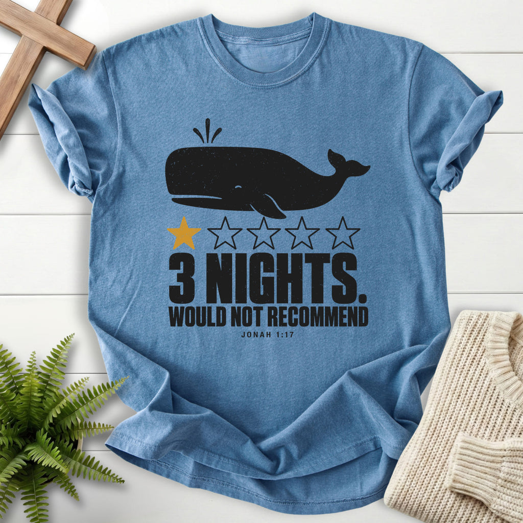 Flatlay of a Blue Jean women's Christian tee with minimal whale artwork with "3 Nights Jonah 1 17 Dark T-Shirt".