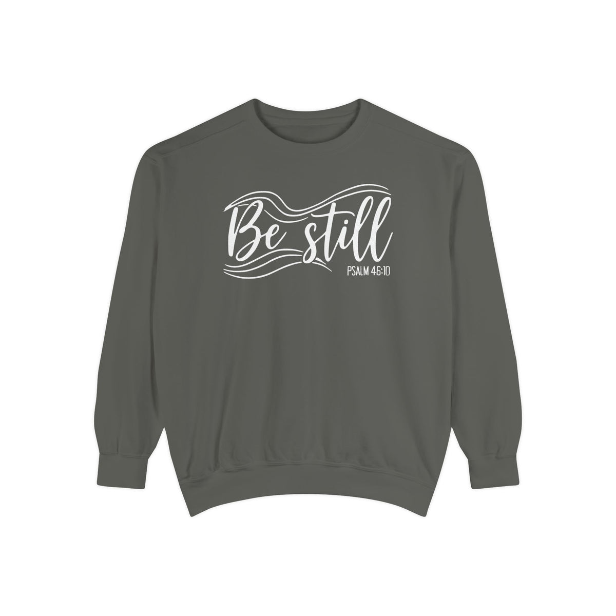 Pepper Christian sweatshirt reading Be still in flowing brush script with sweeping lines, Psalm 46:10