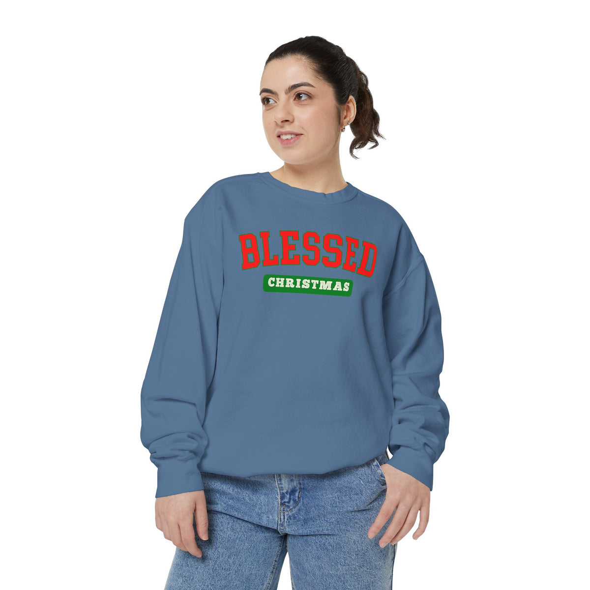 Christian Christmas sweatshirt with Blessed in varsity-style lettering above a Christmas banner.