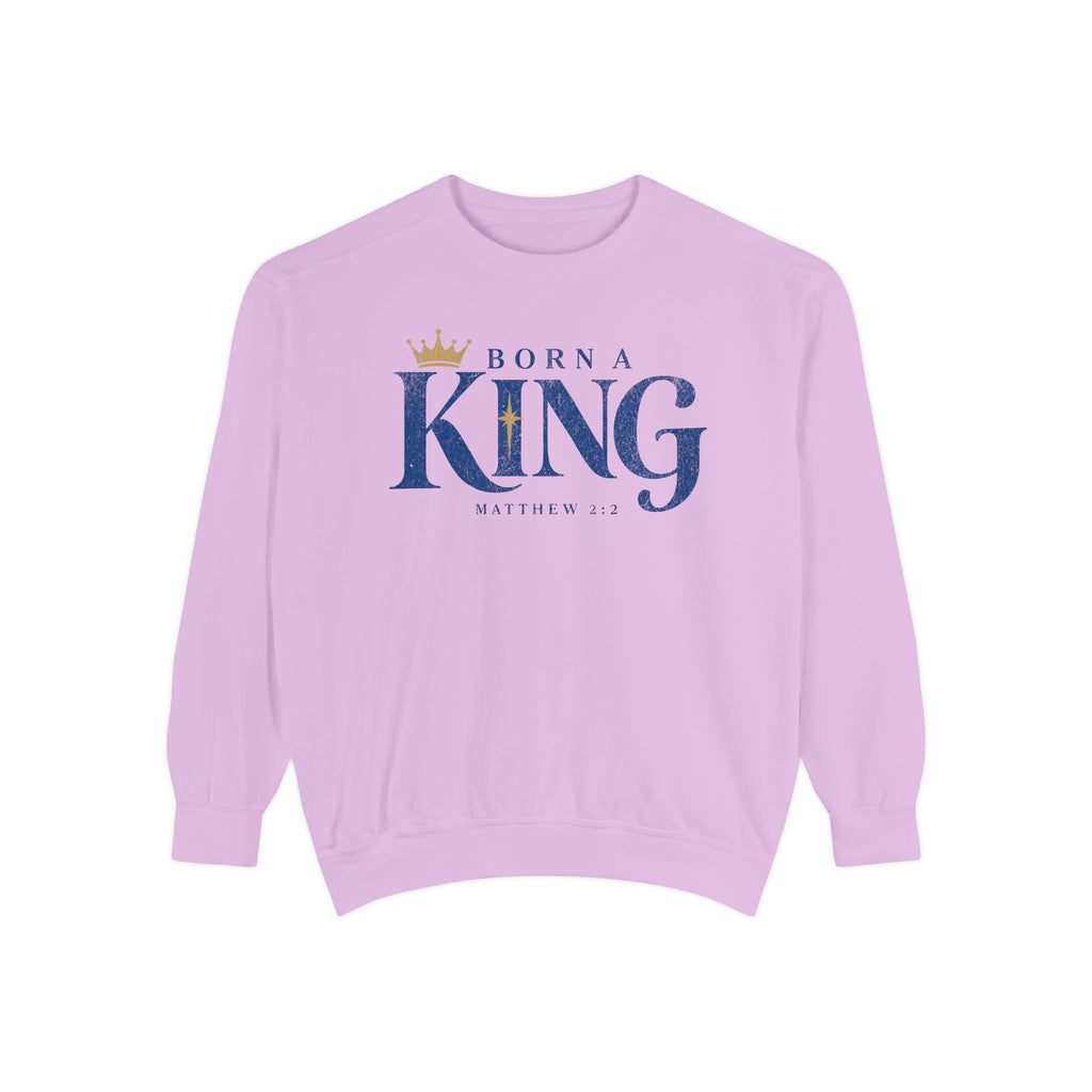 Orchid Christian Christmas sweatshirt with Born a King lettering, a crown, a star and Matthew 2:2.