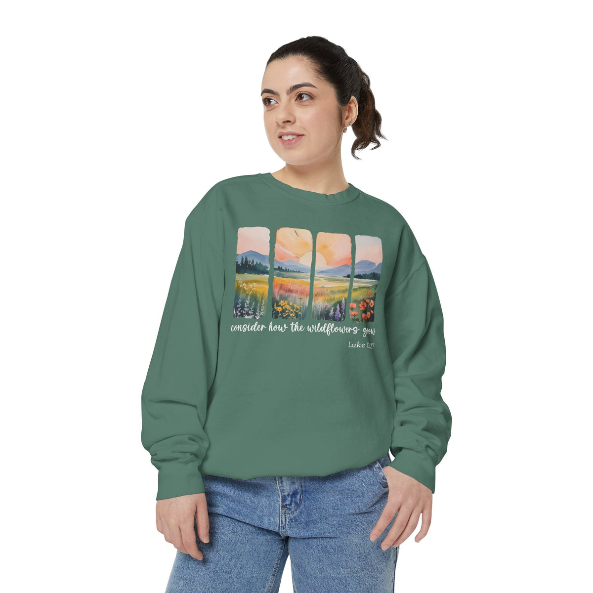 Christian sweatshirt with four painted panels of sunrise over hills and a wildflower meadow, reading consider how the wildflowers grow, Luke 12:27