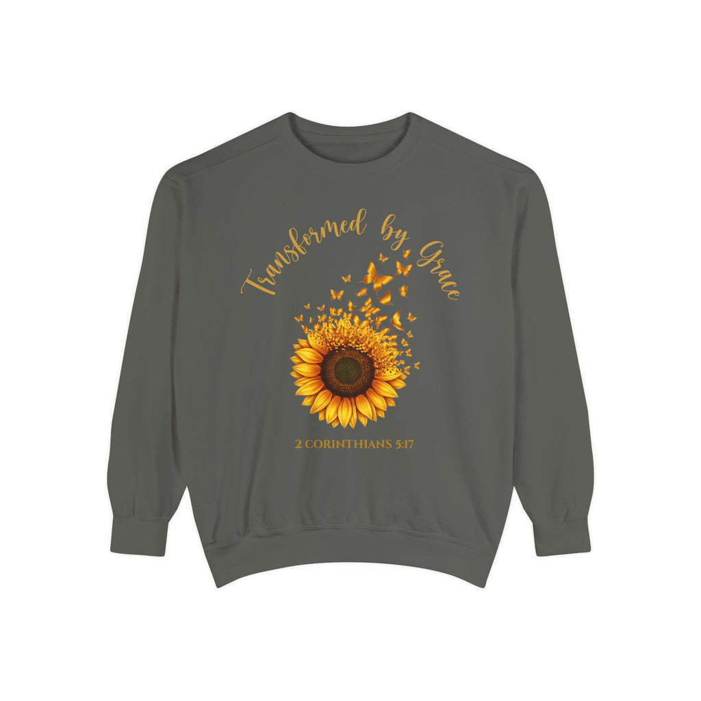 Pepper Christian sweatshirt with a painted sunflower whose petals turn into butterflies, reading Transformed by Grace, 2 Corinthians 5:17