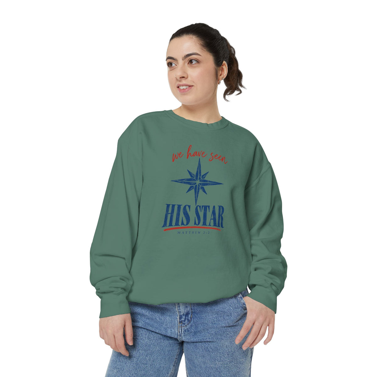 Christian Christmas sweatshirt with We Have Seen His Star lettering, an eight-pointed star and Matthew 2:2.