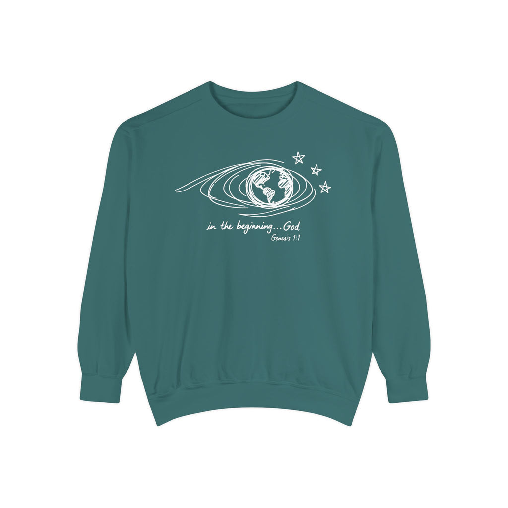 Blue Spruce Christian sweatshirt with hand-sketched Earth, looping orbit lines and three stars, reading in the beginning God, Genesis 1:1