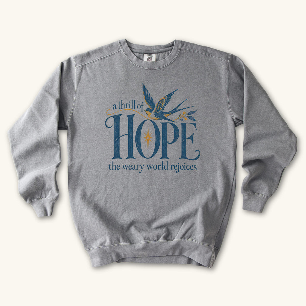 Grey Christian Christmas sweatshirt with A Thrill of Hope, the weary world rejoices lettering, a swallow and a star.
