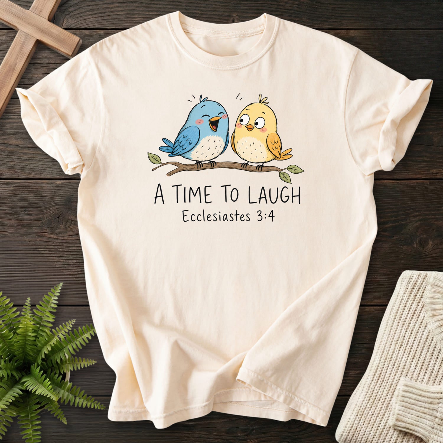 Ivory color option for the A Time To Laugh Faith Birds tee with "A Time To Laugh Faith Birds T-Shirt" Ecclesiastes 3:4 from Printify.