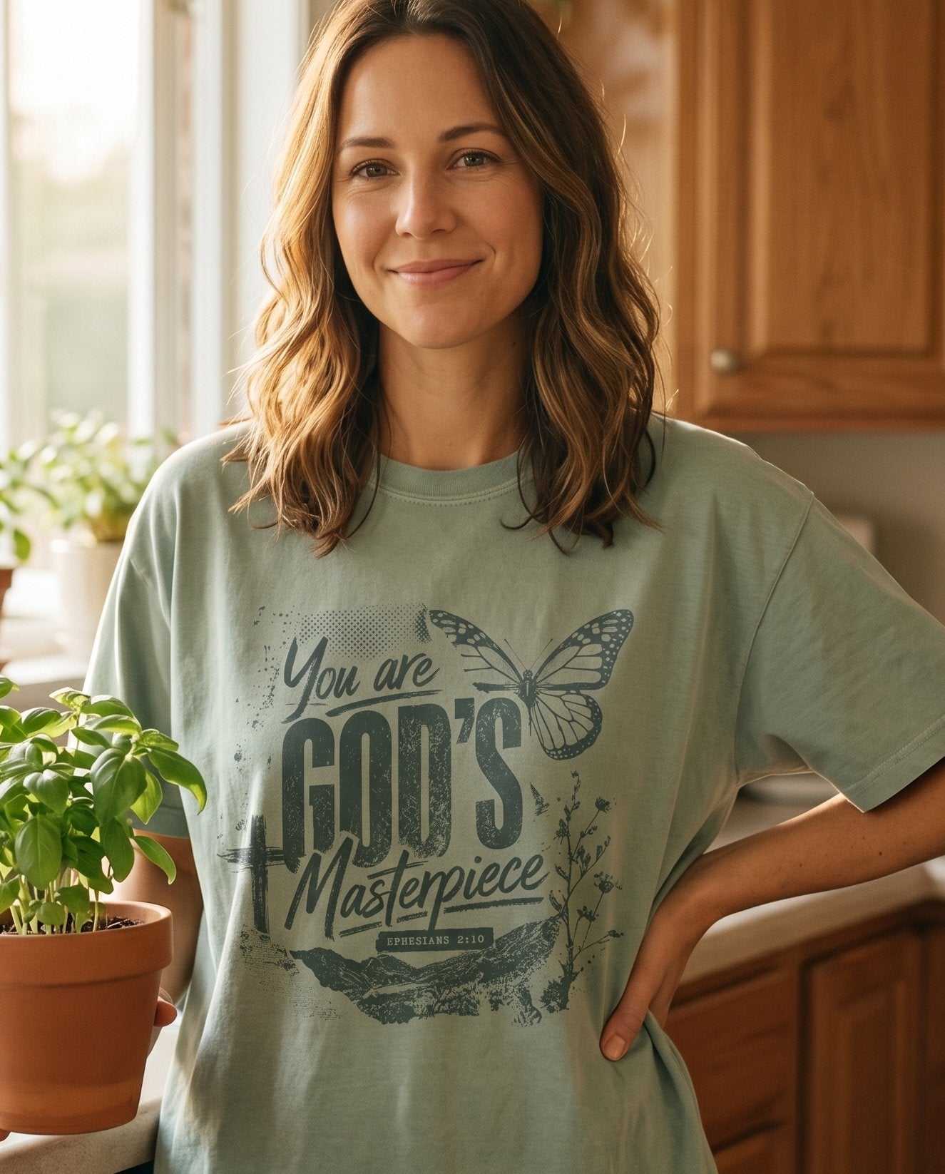 God's Masterpiece – Bay women's Christian tee, lifestyle photo in morning kitchen setting – God's Masterpiece Ephesians 2:10 created to do good works floral botan – She Wears Faith