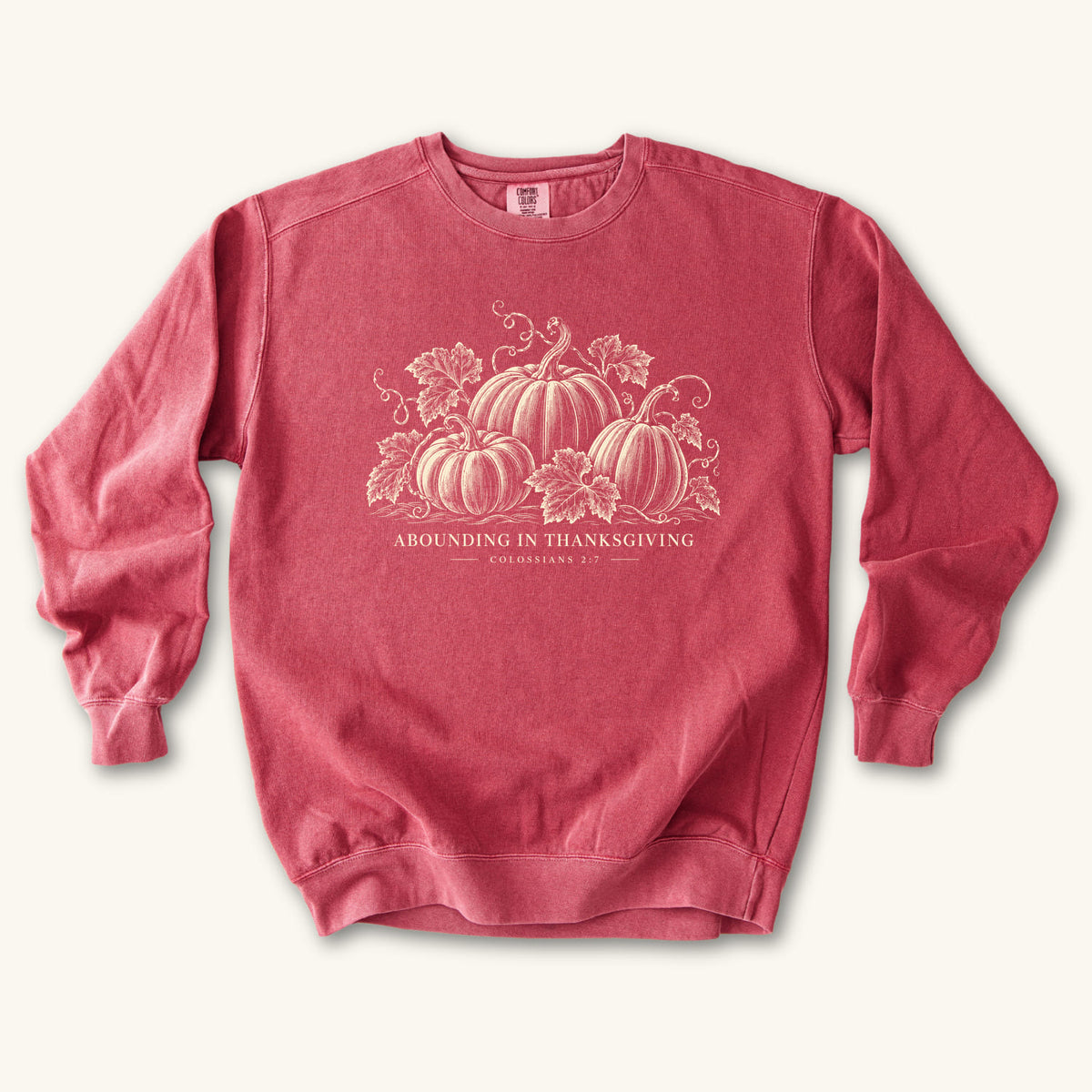 Crimson Abounding IN Thanksgiving sweatshirt flat lay mockup, Colossians 2:7 Christian apparel for women
