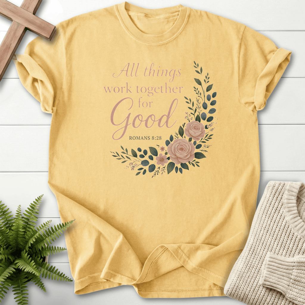 Butter yellow Christian t-shirt for women with a blush watercolor rose wreath and 'All Things Work Together for Good', inspired by Romans 8:28.