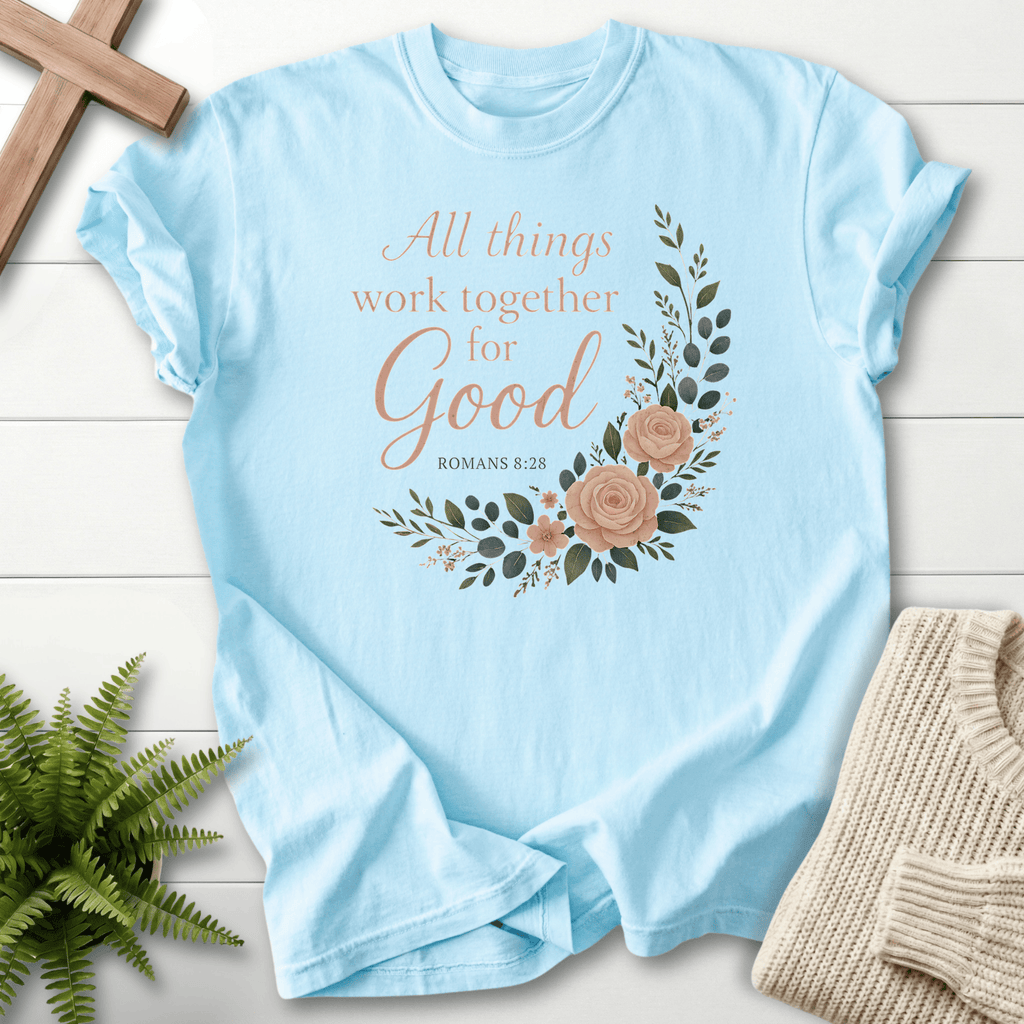 Chambray Christian t-shirt for women with a floral wreath and Romans 8:28 lettering, inspired by Romans 8:28.