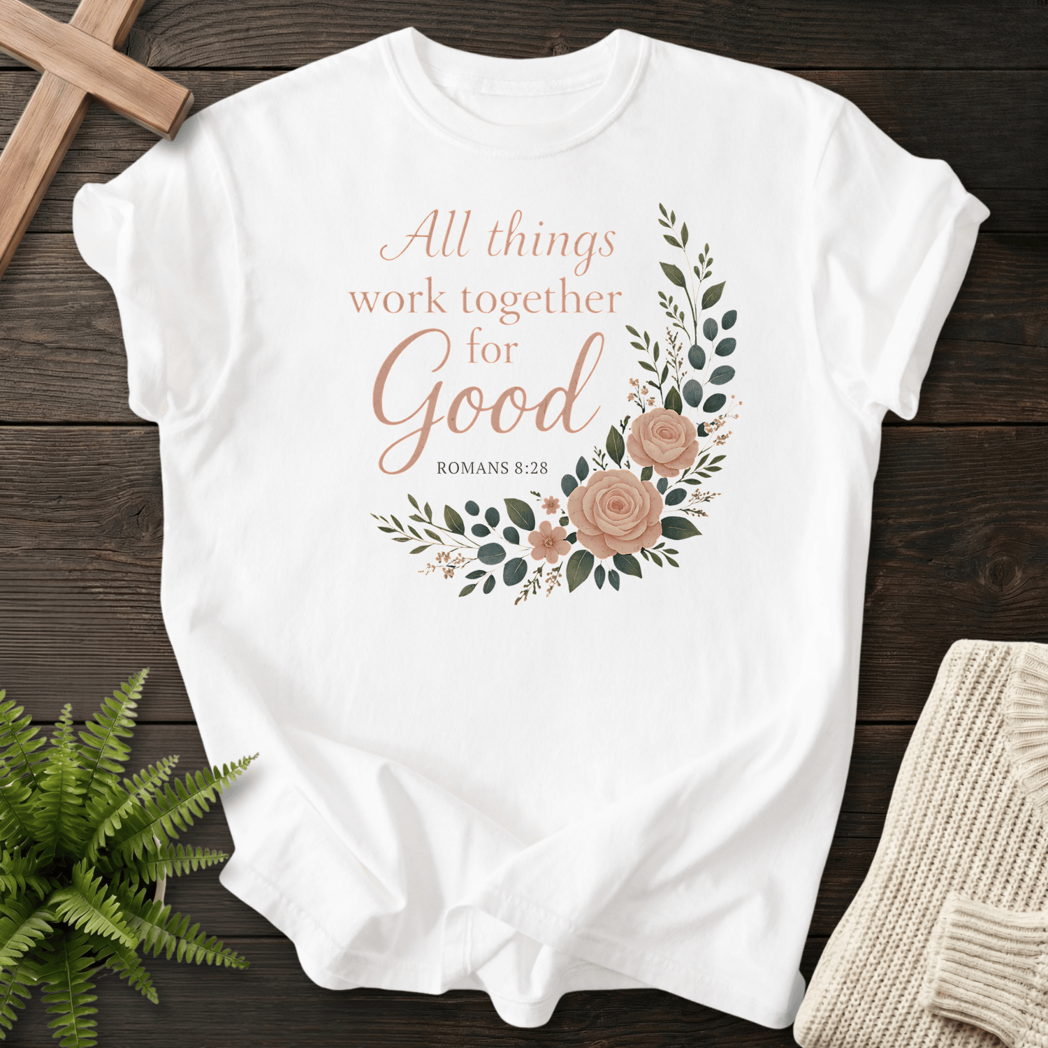 White Christian t-shirt for women with a watercolor rose wreath and 'All Things Work Together for Good', inspired by Romans 8:28.