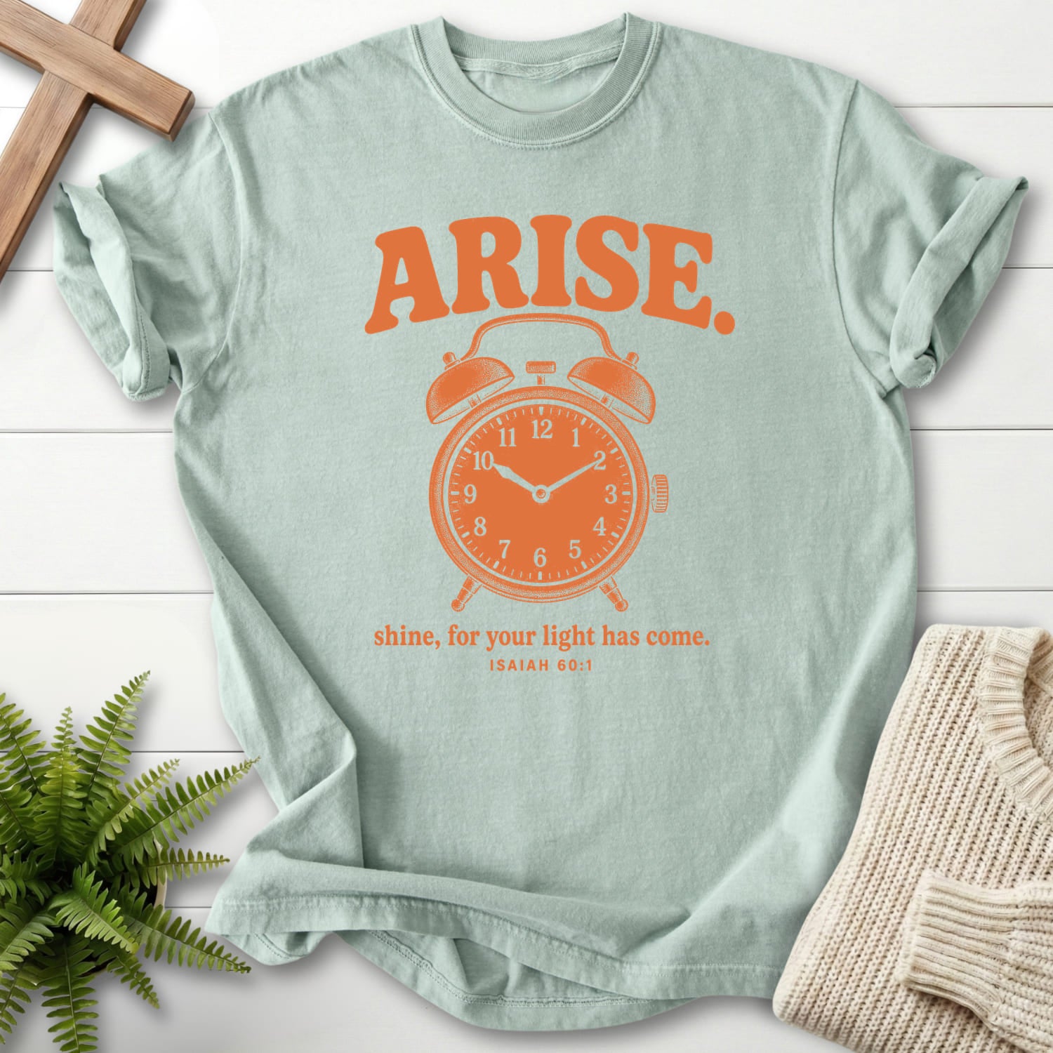 Flat lay of a Bay Comfort Colors 1717 garment-dyed Christian tee featuring "Arise and Shine Isaiah 60 1 T-Shirt" Isaiah 60:1 From Printify.