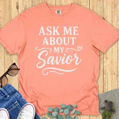 Comfort Colors 1717 faith-based Christian apparel in terracotta peach with the phrase “Ask Me About My Savior” in bold white lettering and heart accent.