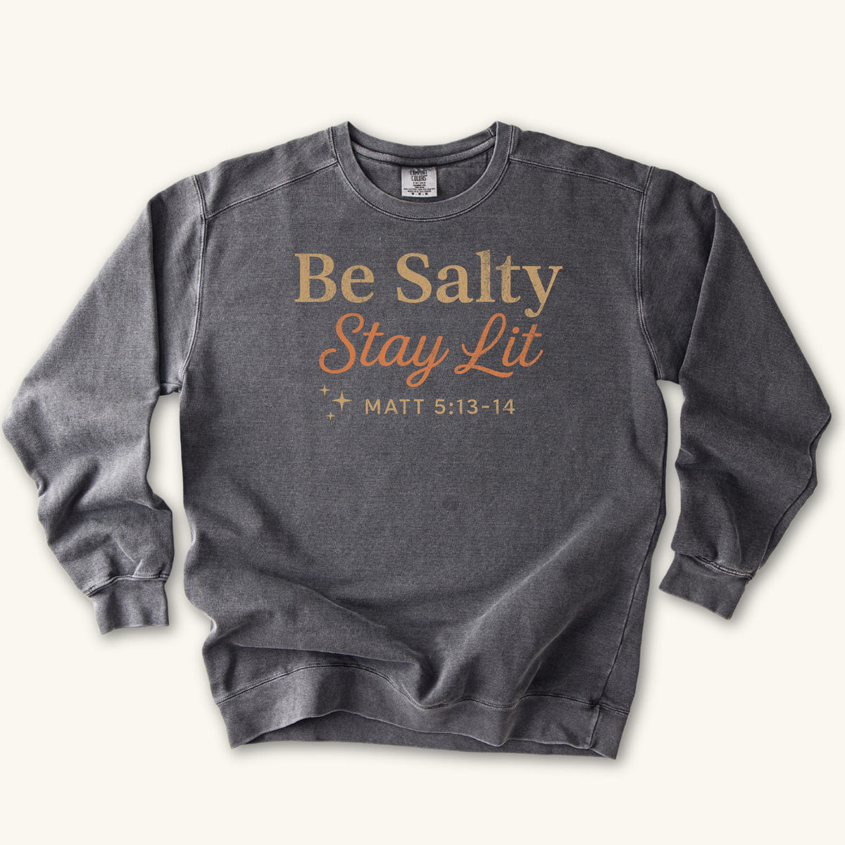 Pepper Christian sweatshirt reading Be Salty Stay Lit in serif and script lettering with sparkles, Matthew 5:13-14