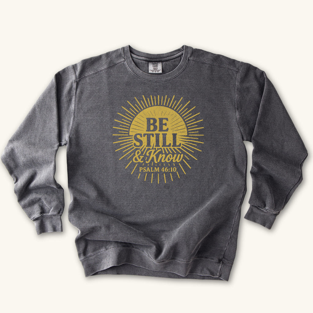 Pepper Be Still & Know Sunburst sweatshirt flat lay mockup, Psalm 46:10 Christian apparel for women