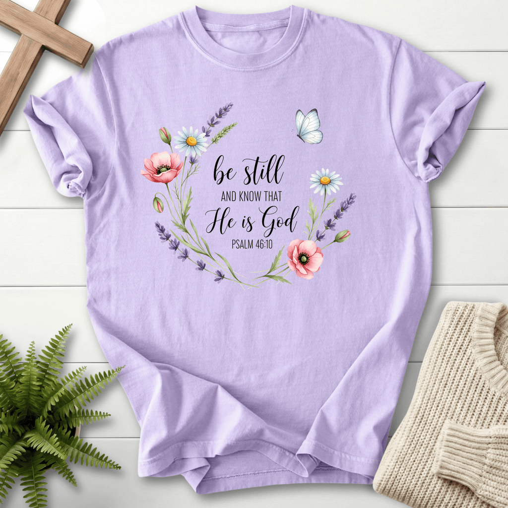 Orchid Christian t-shirt for women with a watercolor wildflower wreath design, She Wears Faith, inspired by Psalm 46:10.