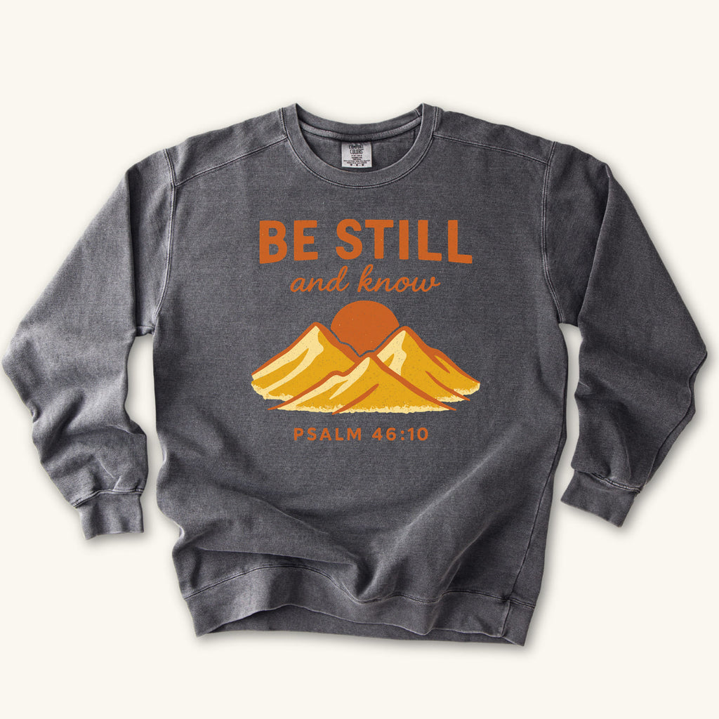 Pepper Be Still Mountain Sunrise sweatshirt flat lay mockup, Psalm 46:10 Christian apparel for women