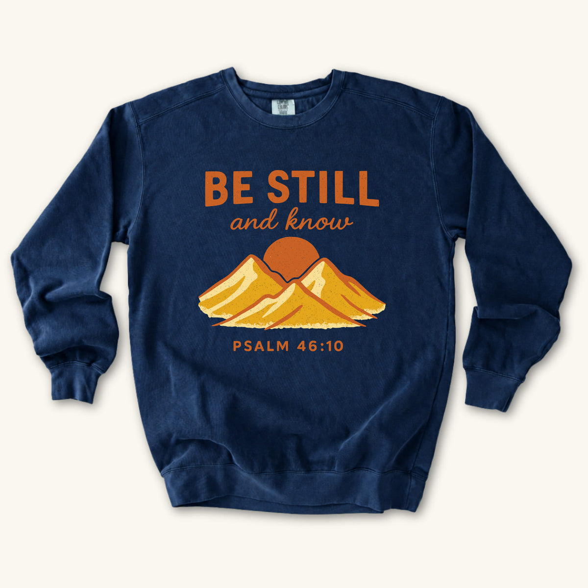 True Navy Be Still Mountain Sunrise sweatshirt flat lay mockup, Psalm 46:10 Christian apparel for women