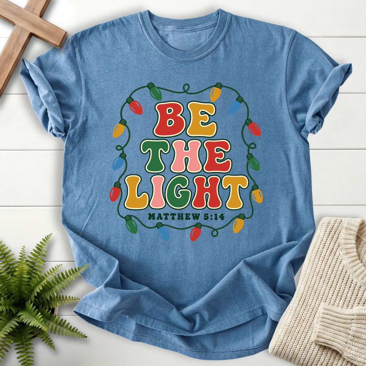 Blue Jean Be the Light Christmas Lights T-shirt flat lay mockup, Matthew 5:14 Christian apparel for women
