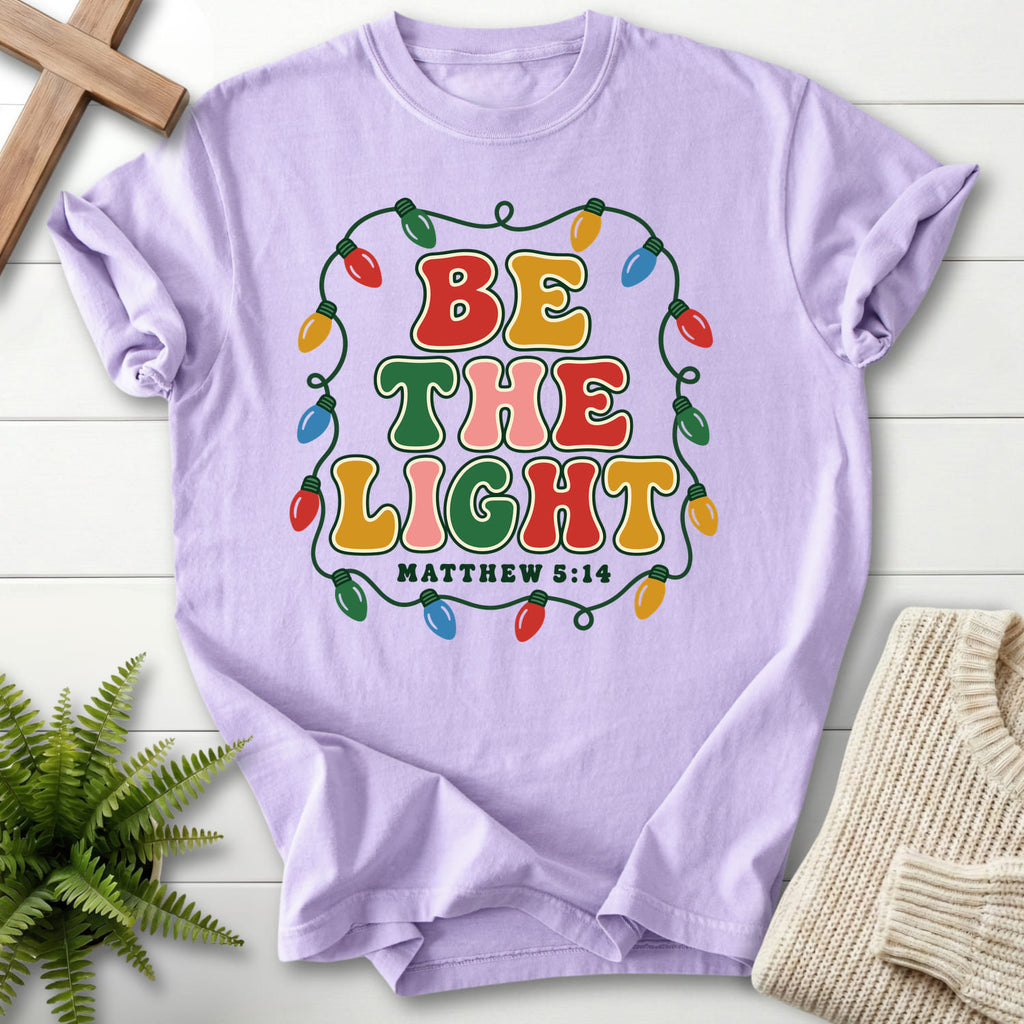 Orchid Be the Light Christmas Lights T-shirt flat lay mockup, Matthew 5:14 Christian apparel for women