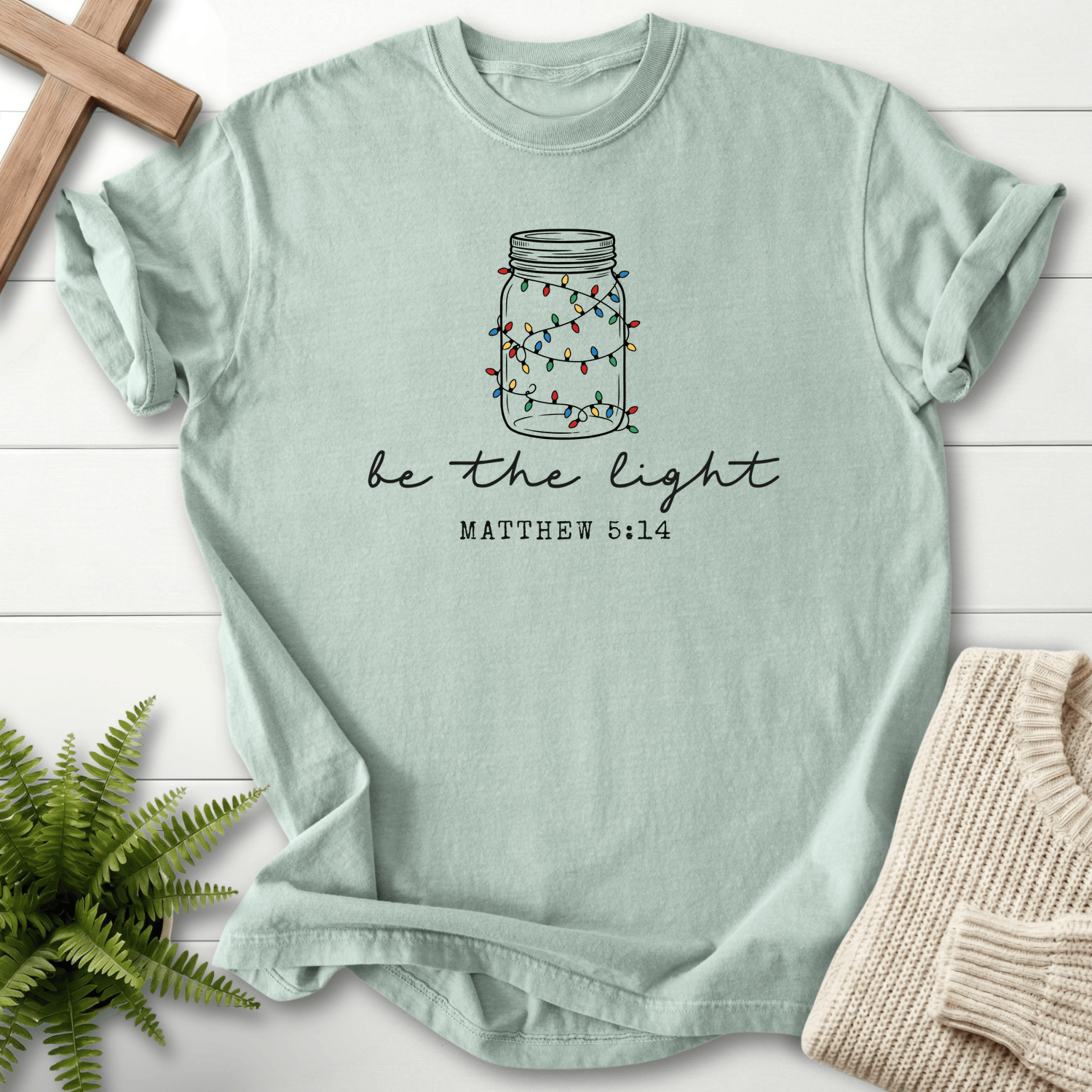Bay Christian t-shirt for women with a mason jar light illustration and 'Be the Light', inspired by Matthew 5:14.