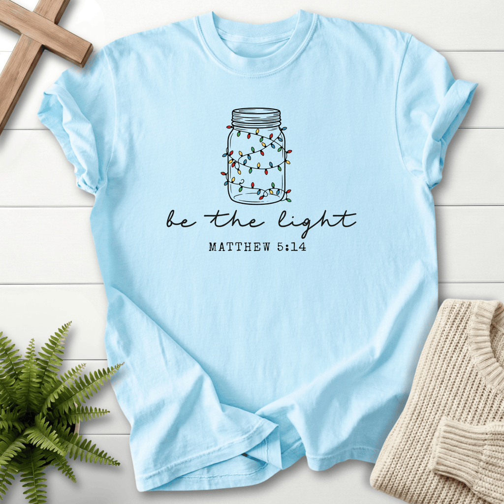 Chambray Christian t-shirt for women with mason jar Christmas lights and 'Be the Light', inspired by Matthew 5:14.