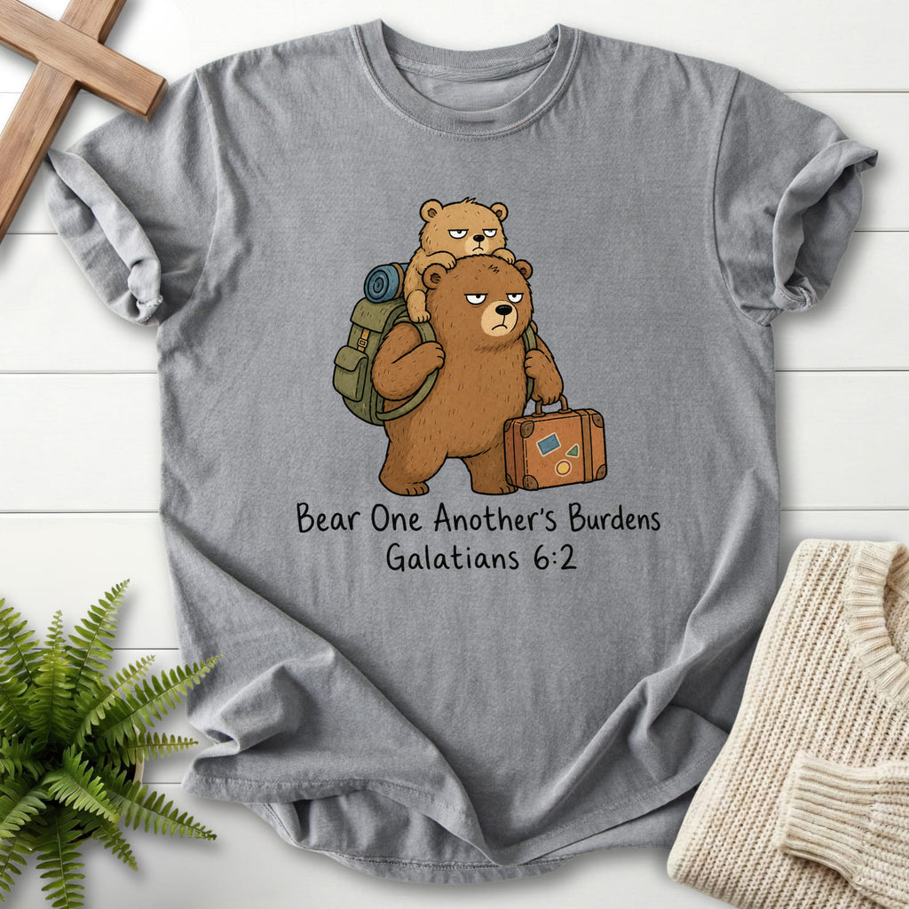 Flat lay of a Grey Christian shirt featuring "Bear One Another's Burdens T-Shirt" Galatians 6:2.