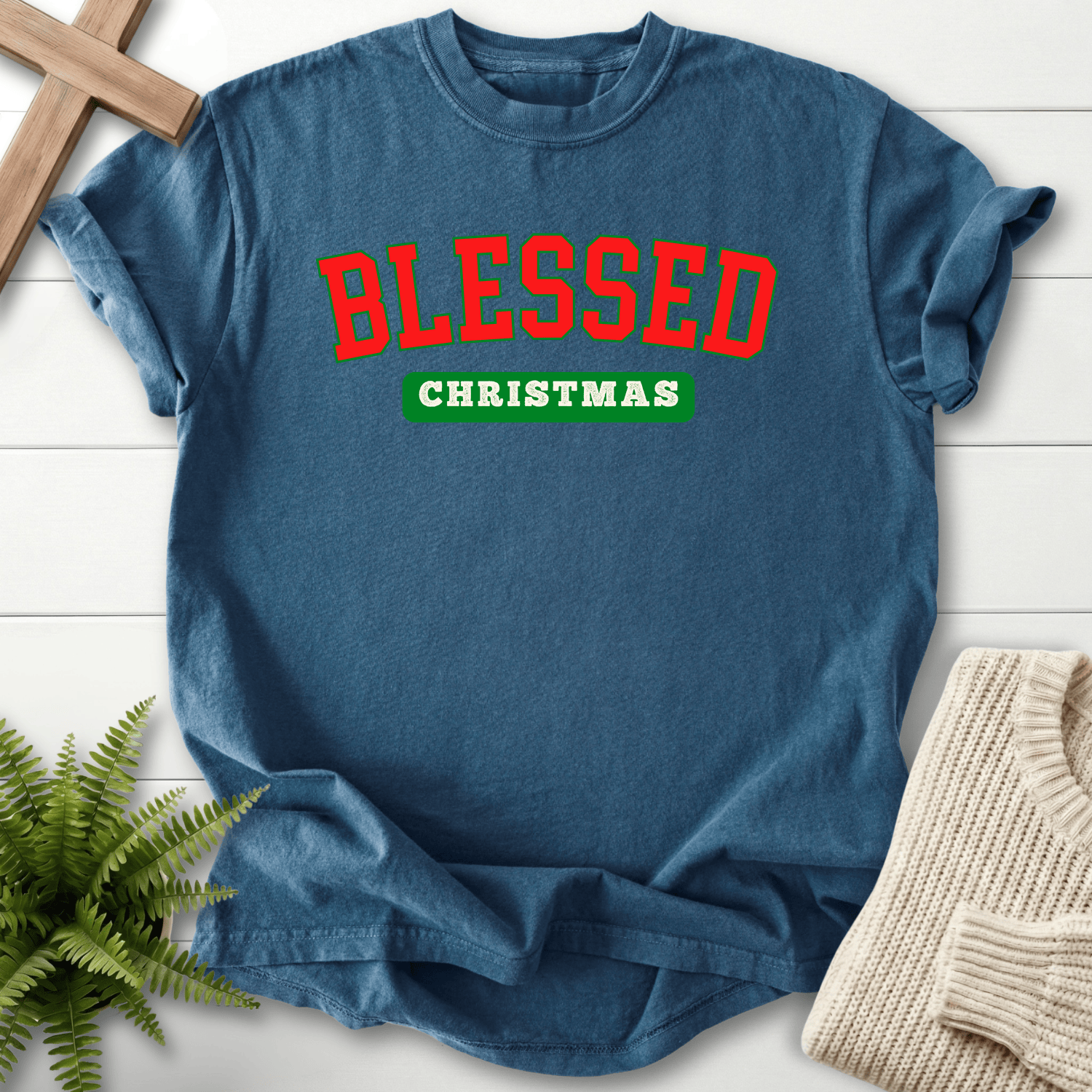 Midnight Christian t-shirt for women with a vintage varsity graphic in red and green and 'Blessed Christmas'.