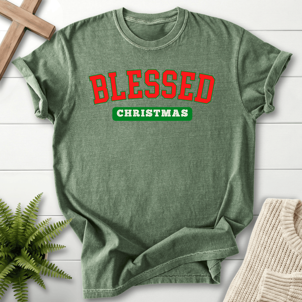Moss green Christian t-shirt for women with bold collegiate red and green 'Blessed Christmas' lettering.
