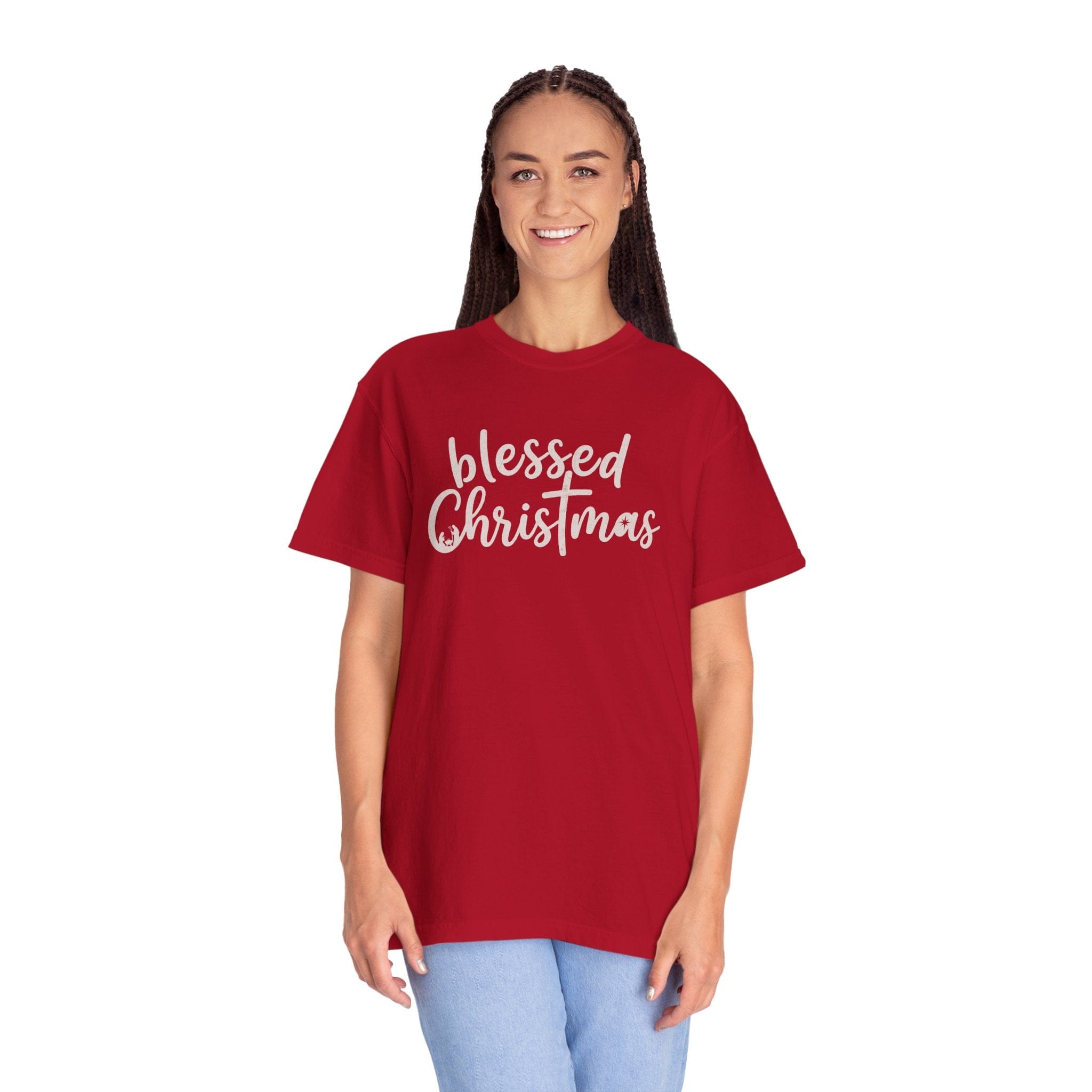 Person wearing a red 'blessed Christmas' t-shirt on a white background