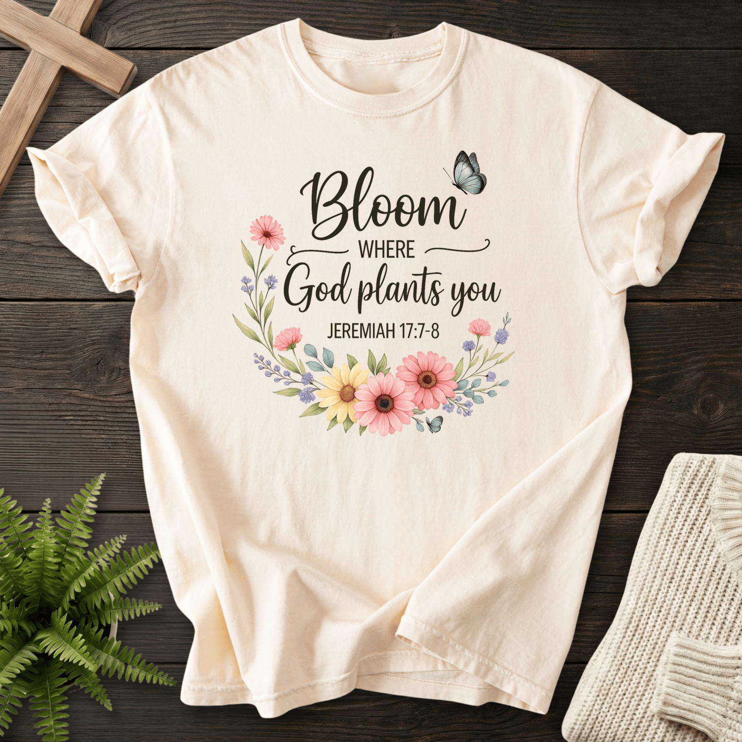 Ivory Christian t-shirt for women with a floral wreath and butterfly accent, inspired by Jeremiah 17:7-8.