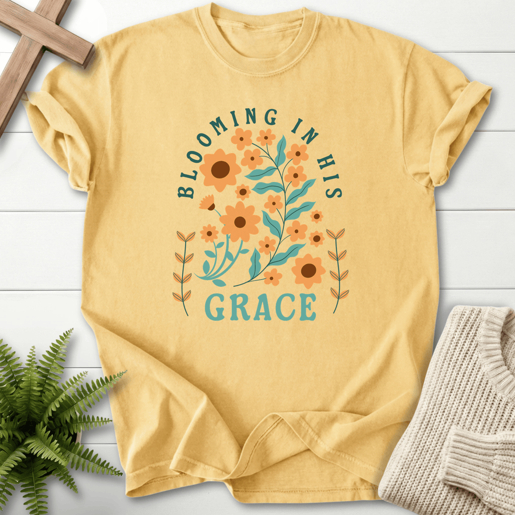 Butter yellow Christian t-shirt for women with orange sunflower and teal Grace design.