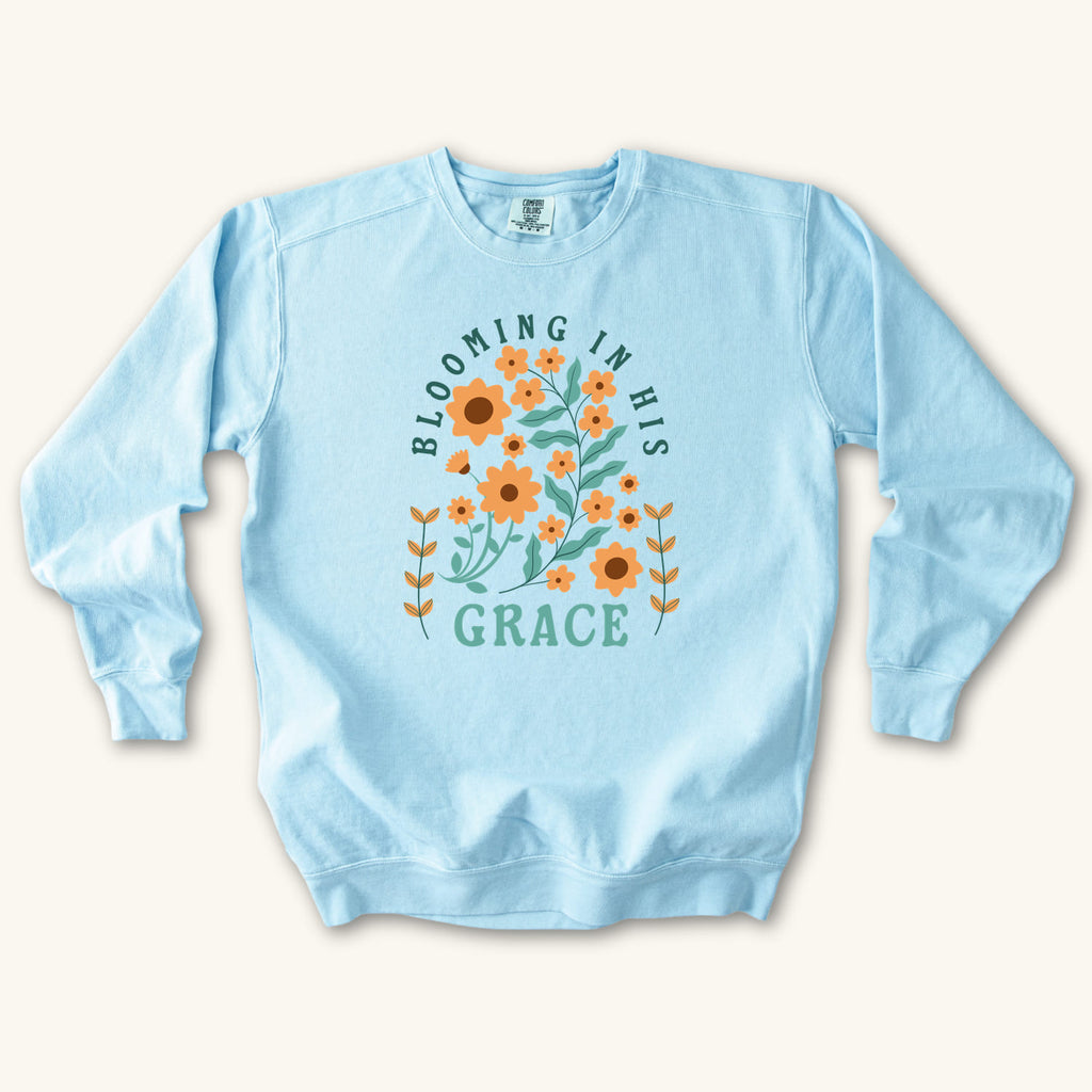 Chambray Blooming in His Grace sweatshirt flat lay mockup, Christian apparel for women
