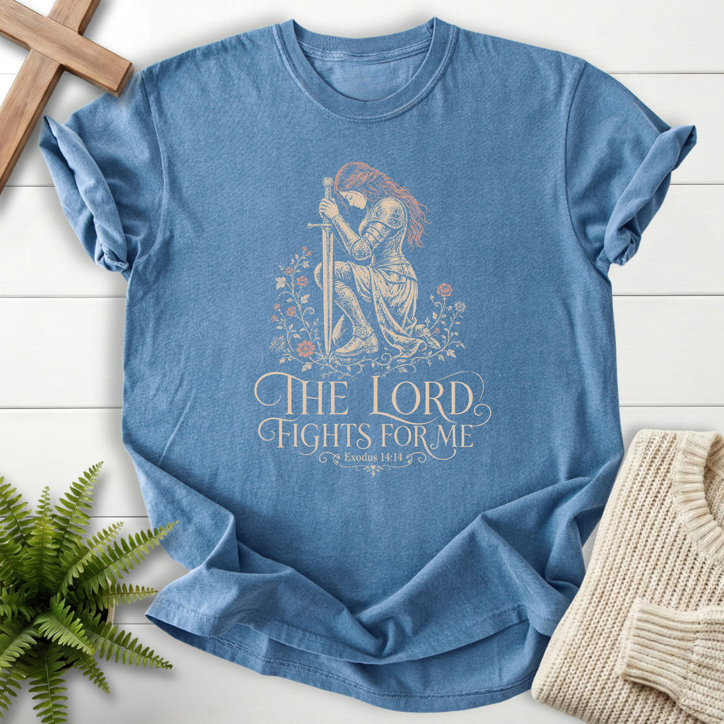 Flatlay of a Blue Jean Bible verse tee with floral line art with "The LORD Fights For Me T-Shirt" Exodus 14:14.