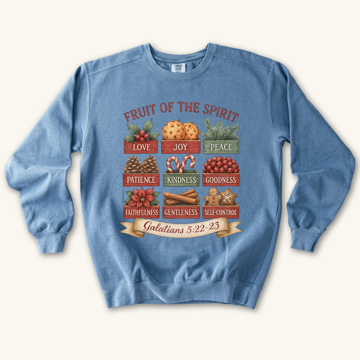 Blue Jean Christmas Christian sweatshirt with nine vintage crates of holly, oranges, pine, pinecones, candy canes, berries, poinsettia, cinnamon and gingerbread labeled with the fruit of the spirit