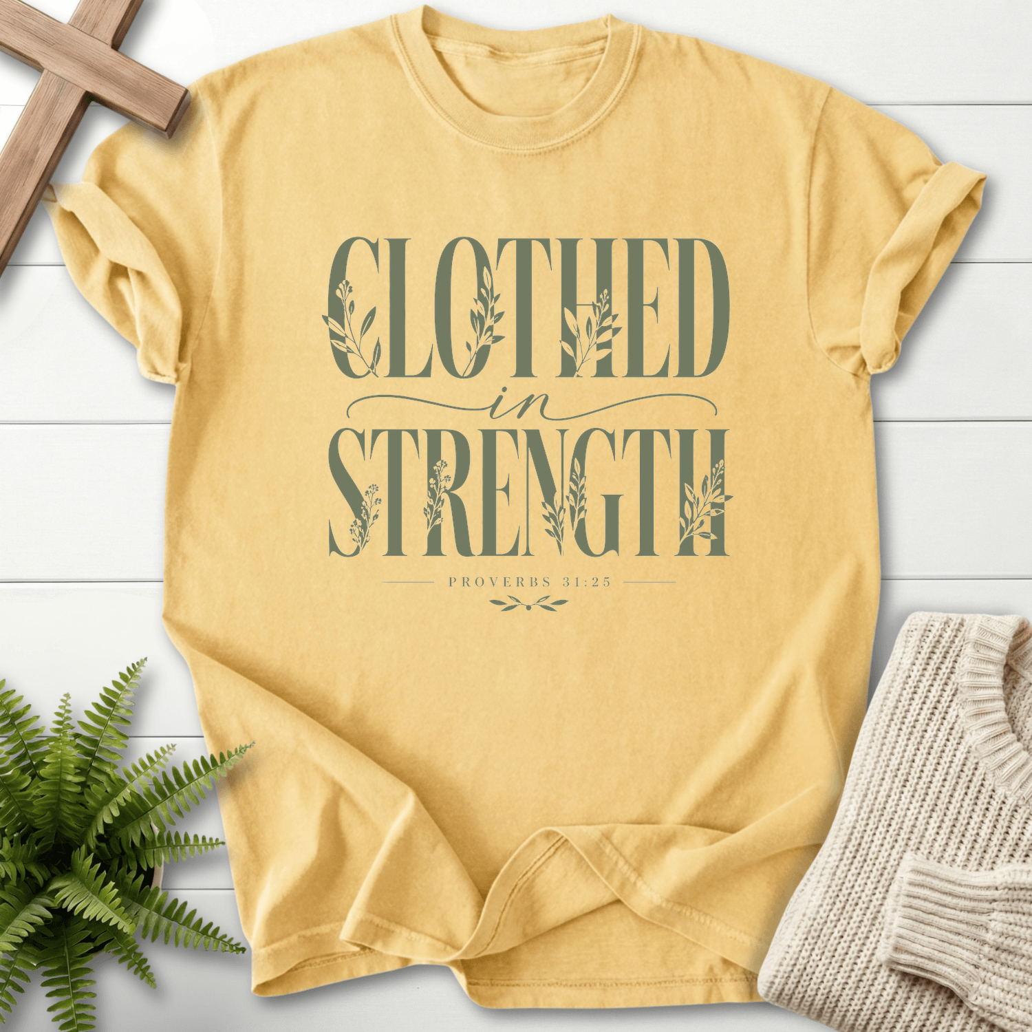 Clothed in Strength Proverbs 31:25 T-Shirt in Butter | She Wears Faith