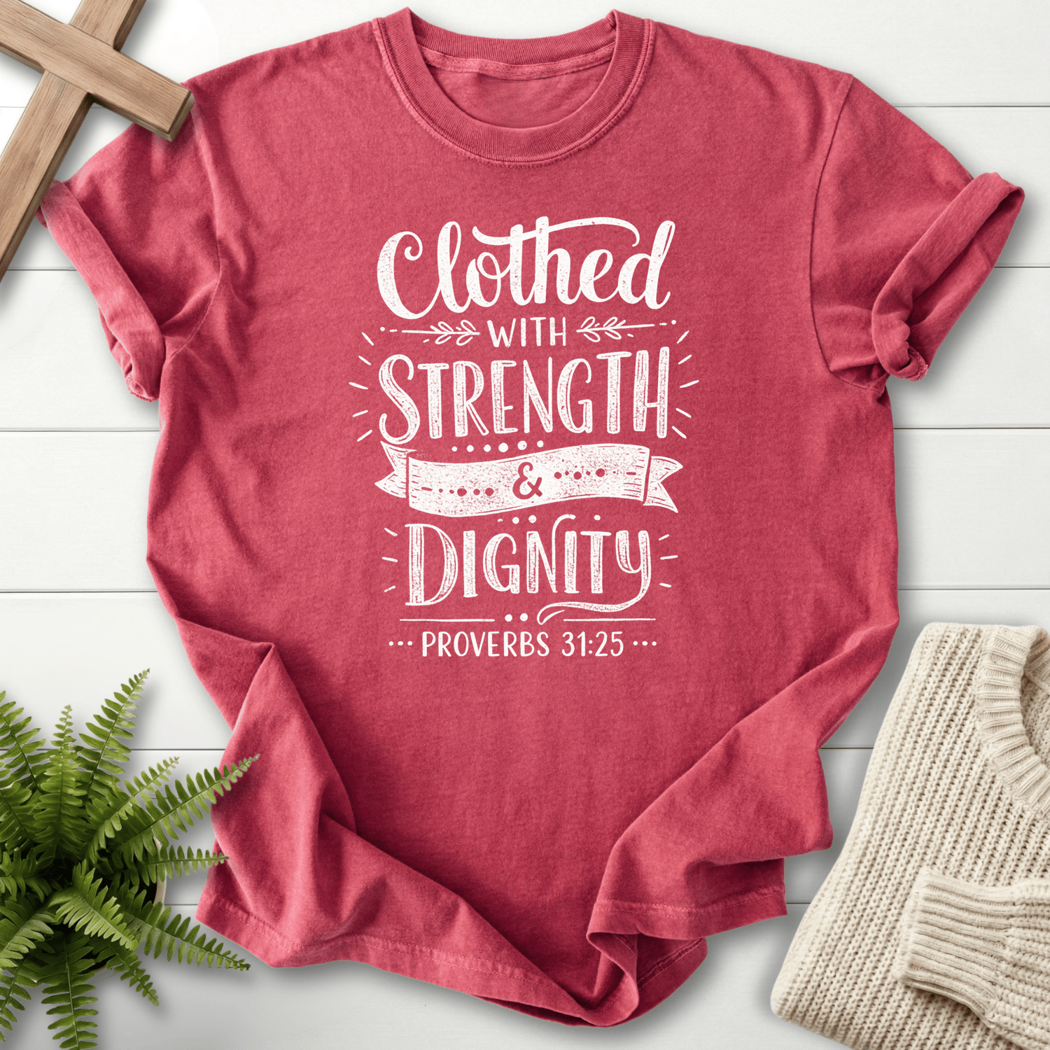 Crimson Christian t-shirt for women with bold distressed white lettering, inspired by Proverbs 31:25.