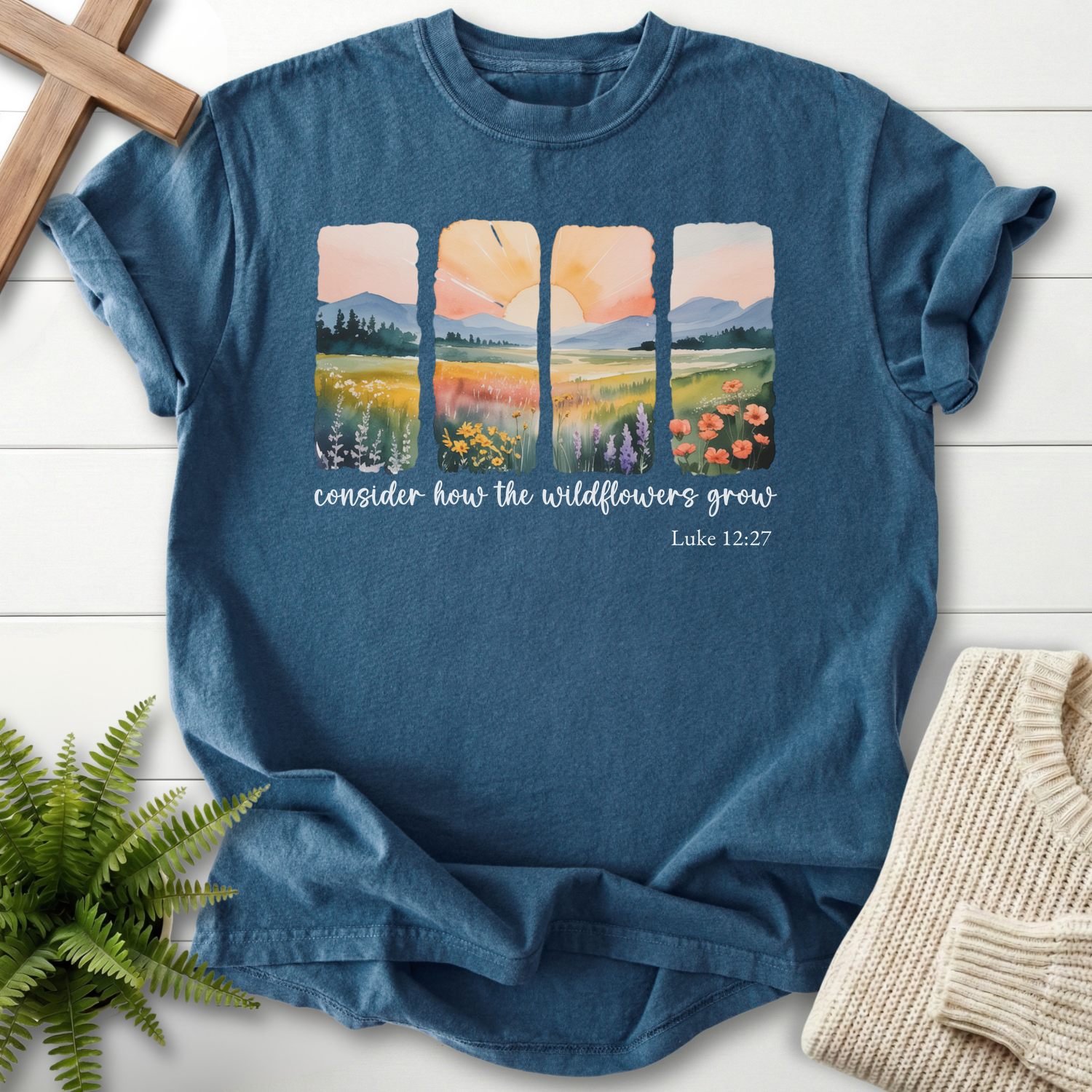 Midnight Christian t-shirt for women with four watercolor landscape panels, inspired by Luke 12:27.