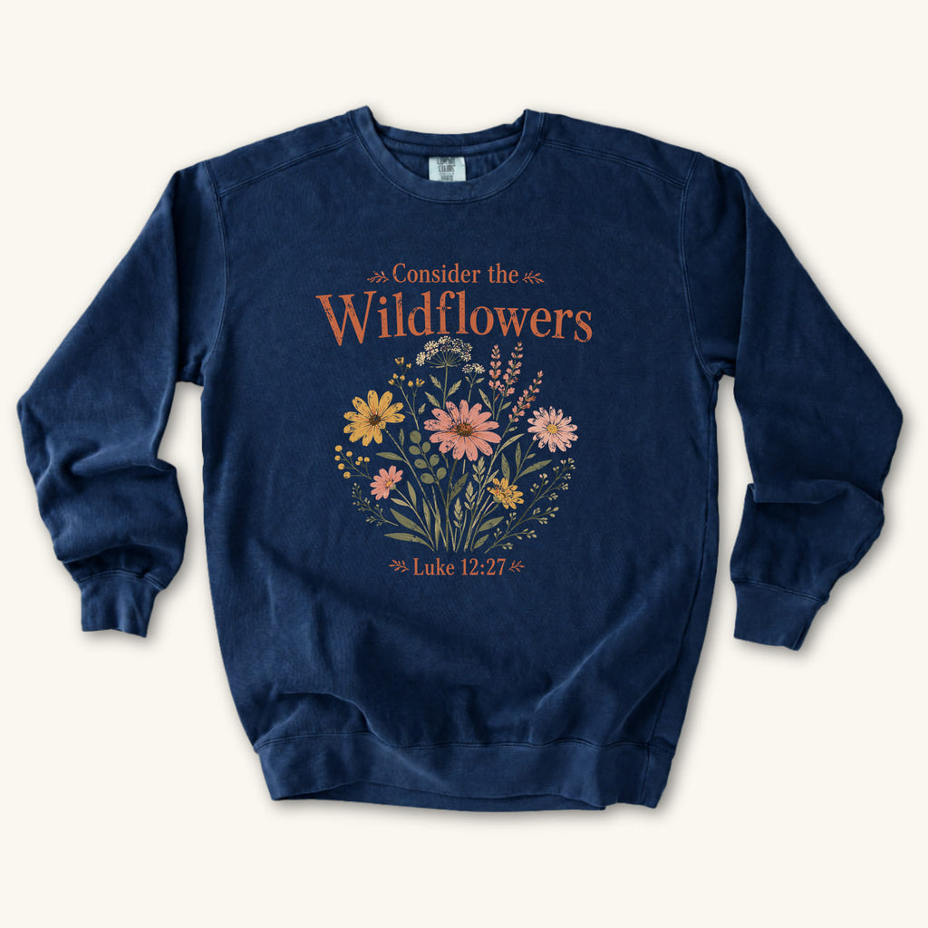True Navy Consider the Wildflowers Boho sweatshirt flat lay mockup, Luke 12:27 Christian apparel for women